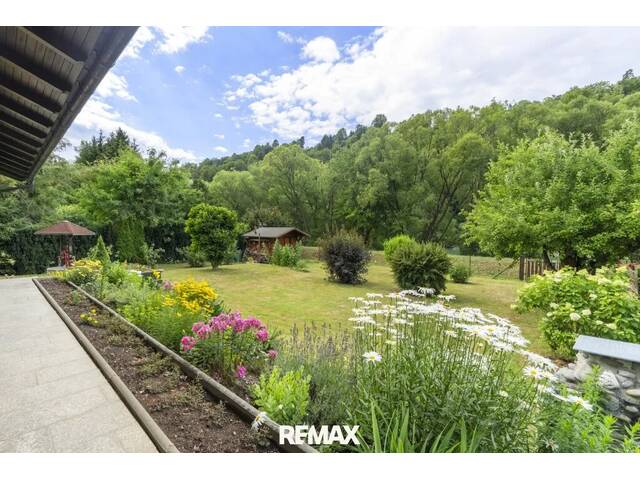 Immobilie in Lavamünd - Gartenparadies in einzigartiger Naturlage: Gemütlicher Bungalow mit Wintergarten direkt an der Drau in Lavamünd - Bild 2