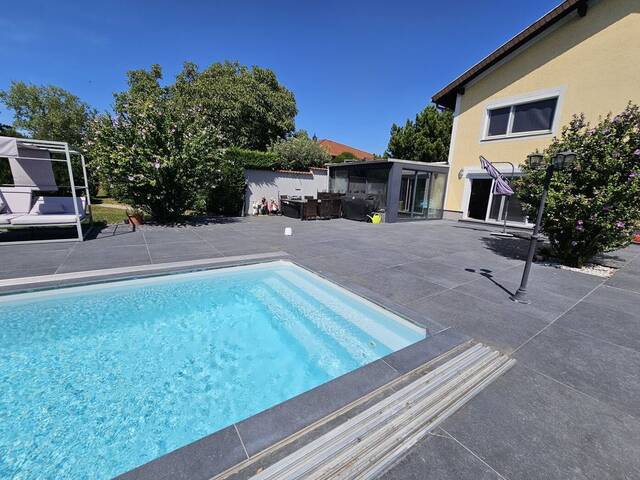 Immobilie in Brunn am Gebirge - Einfamilienhaus mit hochwertiger Ausstattung, Wintergarten, Pool und ca. 1600m² Eigengrund! - Bild 1