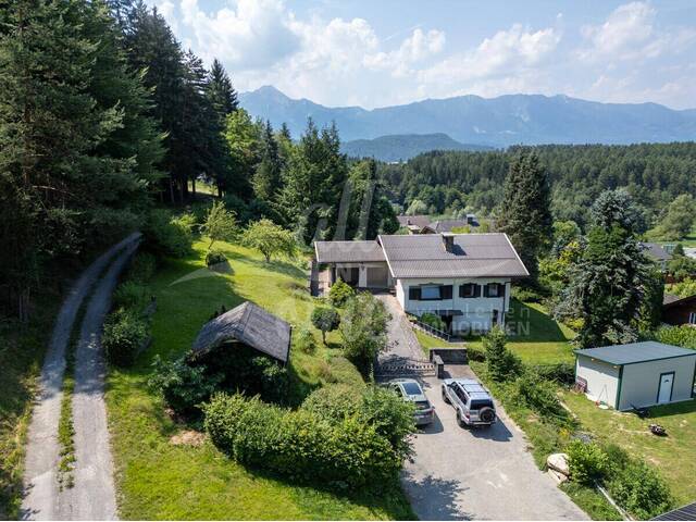Immobilie in Wernberg - Sonniges Zweifamilienhaus mit großem Grundstück und Karawankenblick in Wernberg - Bild 1