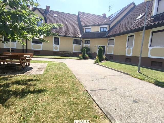 Immobilie in Obervogau - Wohngefühl trifft Gartenflair. 87m² Halbparterrewohnung mit Blick ins Grüne in Obervogau - Bild 0