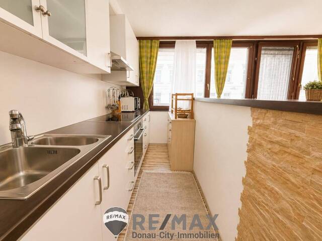 Immobilie in Wien - Helle 2-Zimmer-Eigentumswohnung mit sonniger Loggia | 2. Liftstock | ca. 46 m² NFL - Bild 4