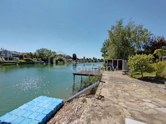 Immobilie in Groß-Enzersdorf - Wohlfühl-Bungalow am Donau-Oder-Kanal - ganzjähriger Rückzugsort für Singles & Paare - Bild 3
