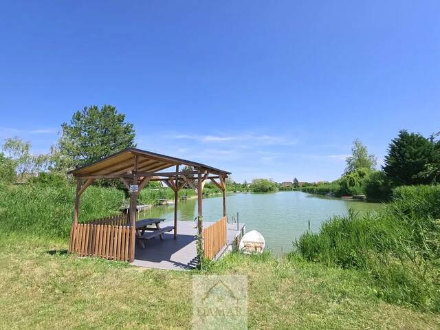 Immobilie in Alberndorf im Pulkautal - Holzhaus mit Garten & Seezugang – Wohnen, wo andere Urlaub machen! - Bild 2