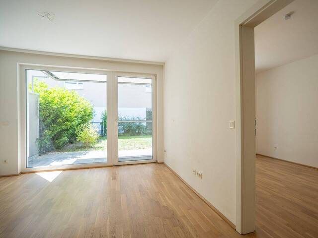 Immobilie in Oberndorf bei Salzburg - GARTENplatz.OBERNDORF | Neuwertige 2-Zimmer-Gartenwohnung mit Tiefgaragen- & Außenstellplatz - Bild 1