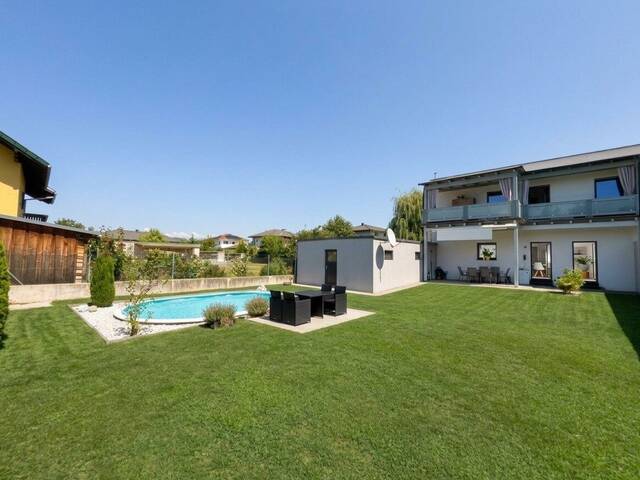 Immobilie in Ebenthal - 3-Zimmer-Wohnung mit Outdoor-Paradies - Terrasse, Garten und Pool! - Bild 0