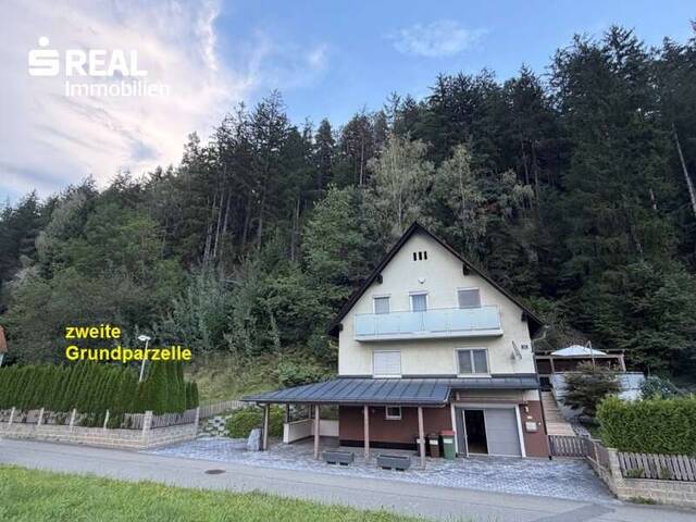 Immobilie in St. Michael in Obersteiermark - Einfamilienhaus mit Terrassenzubau, Flugdach und Carport in ruhiger Randlage von St. Michael in Obersteiermark - Bild 0