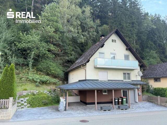 Immobilie in St. Michael in Obersteiermark - Einfamilienhaus mit Terrassenzubau, Flugdach und Carport in ruhiger Randlage von St. Michael in Obersteiermark - Bild 2