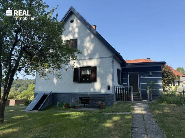 Immobilie in St. Stefan im Rosental - Einfamilienhaus in Lichendorf mit großem Garten, Garage & Nebengebäude - Bild 0