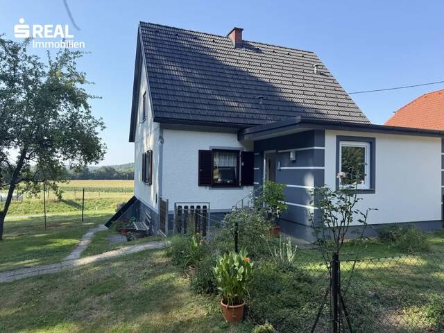 Immobilie in St. Stefan im Rosental - Einfamilienhaus in Lichendorf mit großem Garten, Garage & Nebengebäude - Bild 1