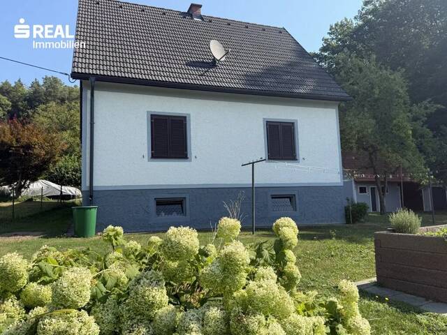 Immobilie in St. Stefan im Rosental - Einfamilienhaus in Lichendorf mit großem Garten, Garage & Nebengebäude - Bild 2