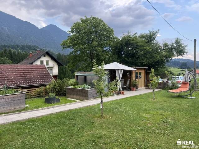 Immobilie in Hermagor - JETZT ZUSCHLAGEN - Ihre Wohlfühloase in Grünburg - 4 Zimmer mit 241m² Eigengarten! - Bild 2