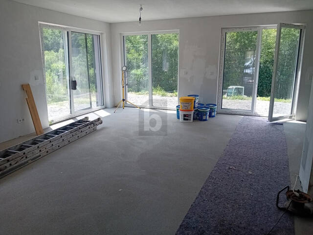 Immobilie in Nestelbach bei Graz - MODERNES DOPPELHAUS IN RUHIGER SONNENLAGE MIT PV-ANLAGE UND CARPORT - Bild 1