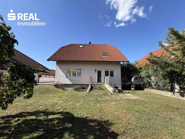 Immobilie in Bruck an der Leitha - Ein Zuhause für die ganze Familie – mit Garten, Keller, viel Platz und ganz viel Potenzial - Bild 1
