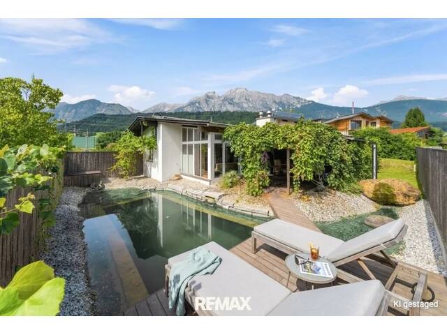 Immobilie in Baumkirchen - Wohnen im Grünen - Einfamilienhaus mit Naturpool & Wintergarten - Bild 0
