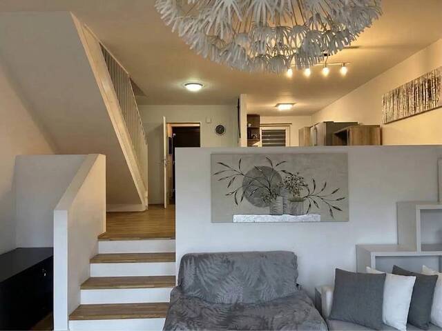 Immobilie in Kirchschlag bei Linz - Neuwertiges Reihenhaus mit Garten, Terrasse und Garage in Kirchschlag - Bild 1