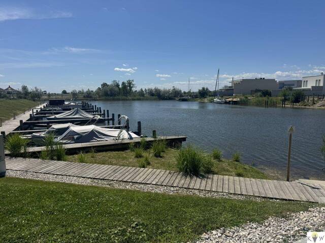 Immobilie in Oggau am Neusiedler See - Wohnen, wo andere Urlaub machen – Exklusive Gartenwohnung direkt am Neusiedler See - Bild 2