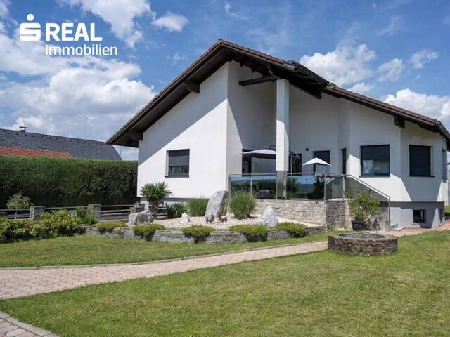Immobilie in Feldkirchen bei Graz - Repräsentativer Bungalow auf über 1.000 m² Grundstück in Feldkirchen bei Graz - Bild 1