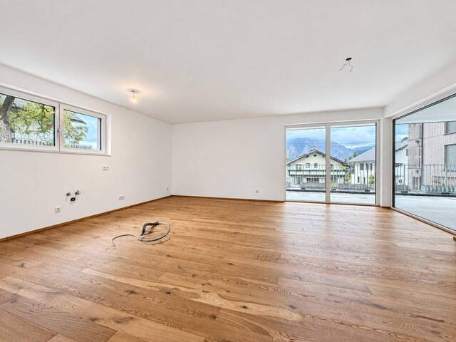 Immobilie in Altmünster - JETZT ALS 4-ZIMMER WOHNUNG VERFÜGBAR! 125 m² Gartenwohnung mit See- und Traunsteinblick - 150 m bis zum See! - Bild 0