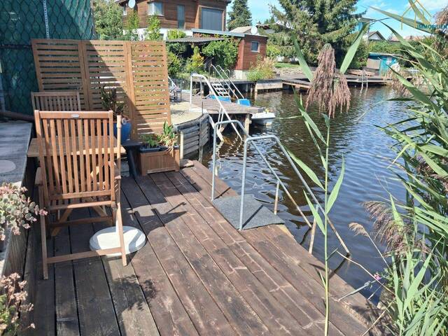 Immobilie in Steinbrunn - Bungalow am See - direkte Uferparzelle - Bild 0