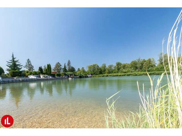 Immobilie in Enzersdorf an der Fischa - Haus am Badesee in Enzersdorf an der Fischa nur 15 Min von Wien entfernt zu kaufen! - Bild 0